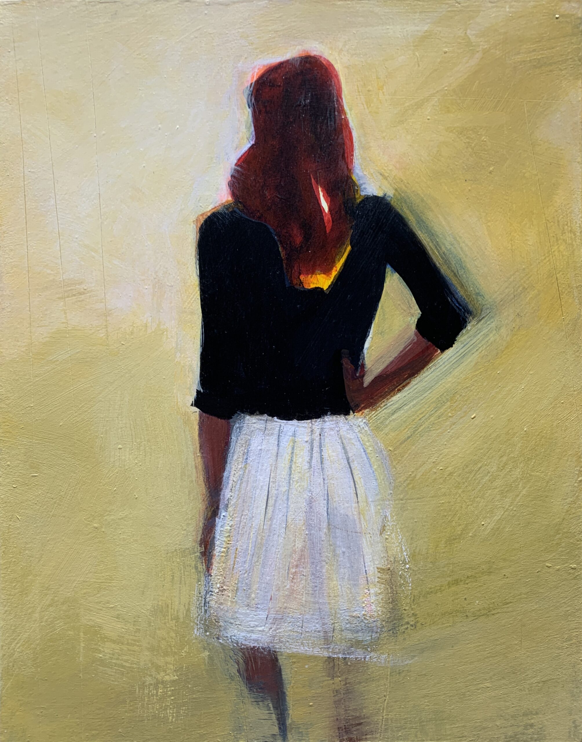 A figure of a woman in a gauzy white skirt and black top emerges from a haze of gold and amber.